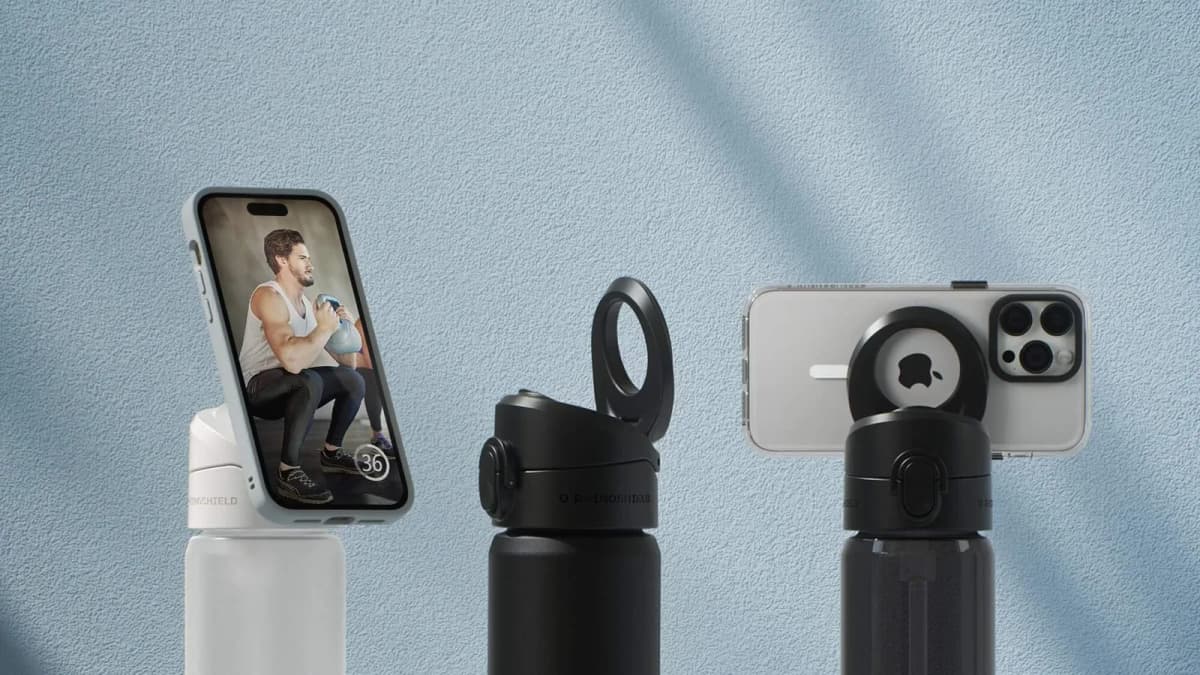 Three Rhinoshield water bottles with magnetic lids holding phones, one screen showing a man doing kettlebell squats