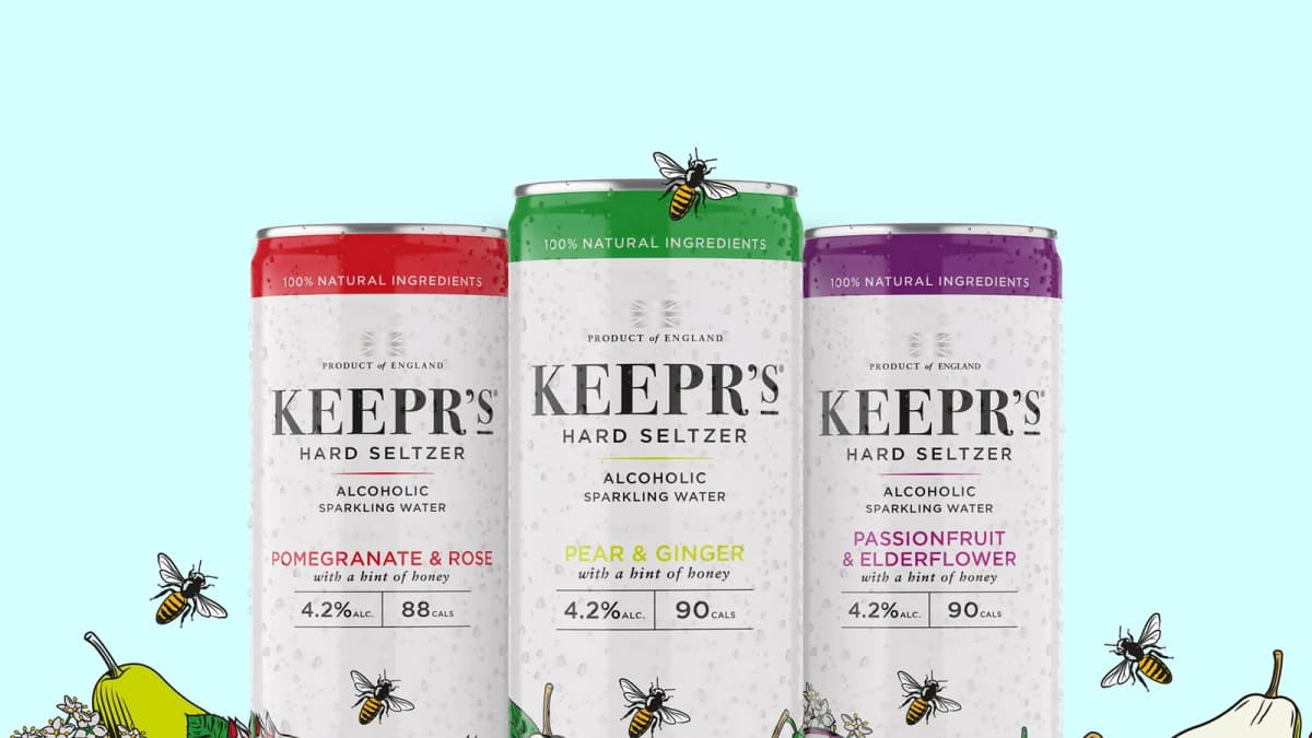 Three Keepr's hard seltzer cans in red, green and purple with illustrated bees and fruit on a light blue background