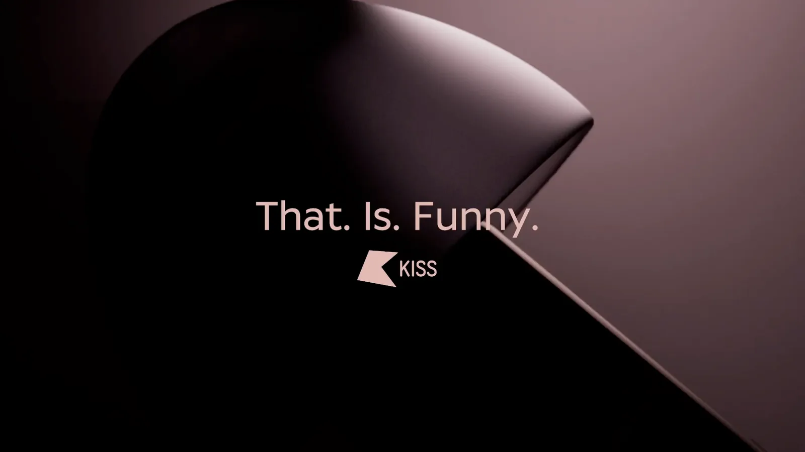 Dark mauve-lit abstract curved shape with the words "That. Is. Funny." in pale pink text and a small logo below