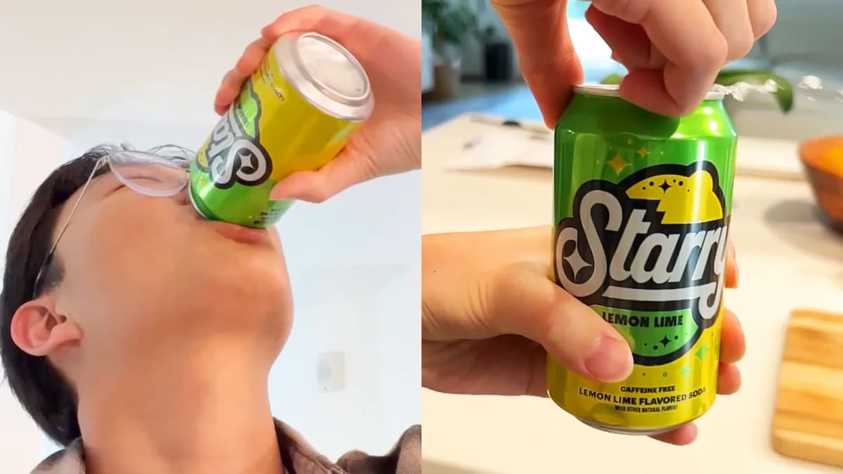 Person in glasses tips back a green "LEMON LIME" soda can to drink; a hand opens the same can over a kitchen counter