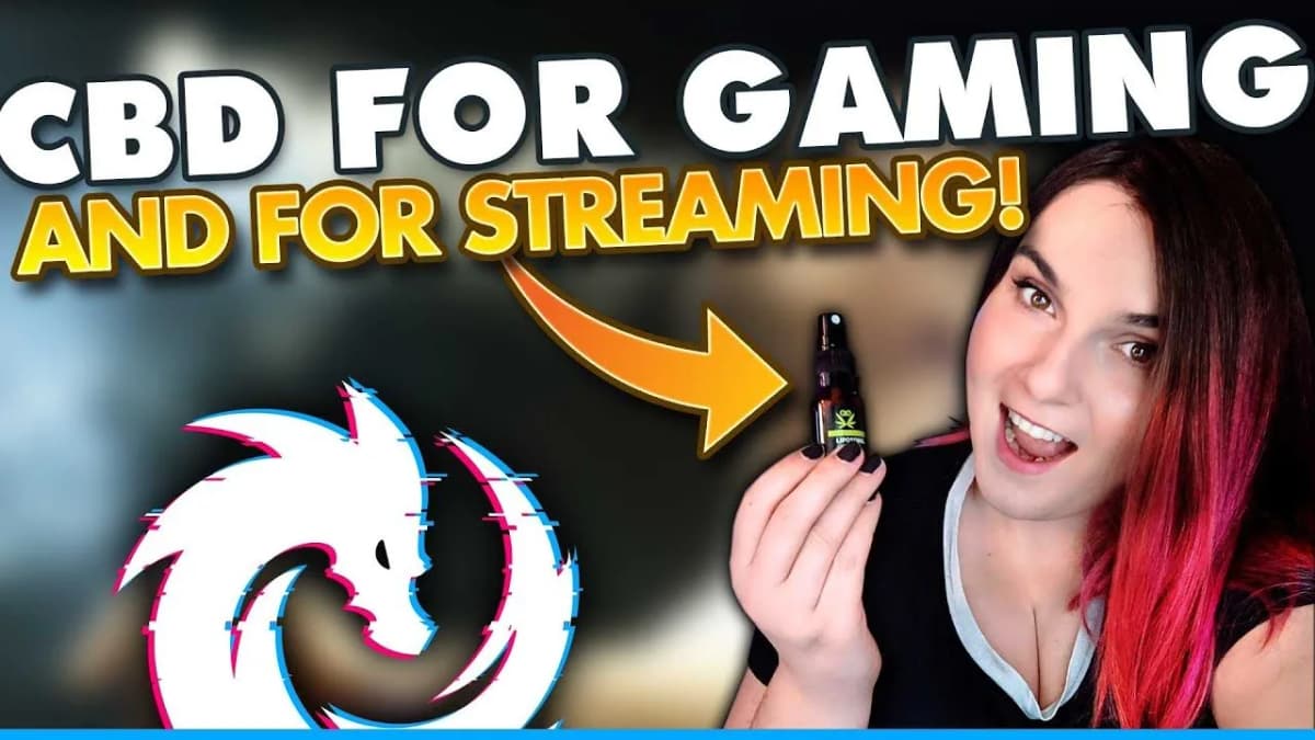 Woman with pink-dyed hair holds up a Smoking Frog CBD spray bottle beside text "CBD FOR GAMING AND FOR STREAMING!"