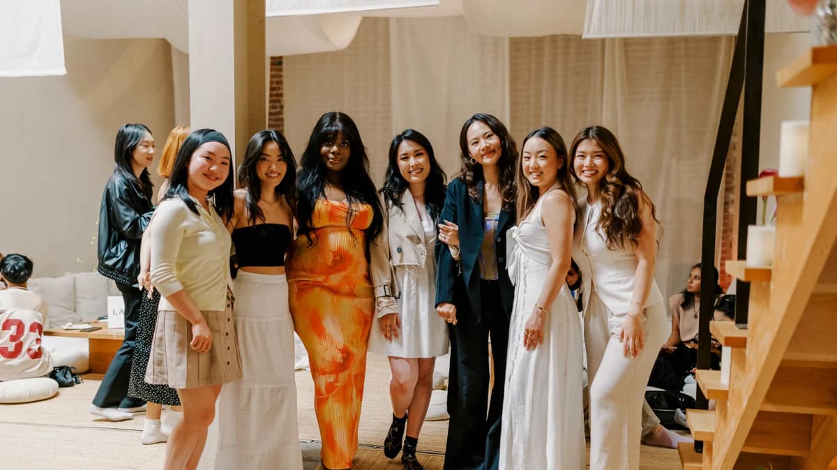 Beauty creators posing together for a group photo